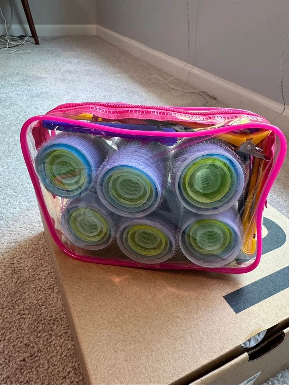 UIN Clear Pink Cosmetic Organizer Bag with Multicolor Hair Rollers
